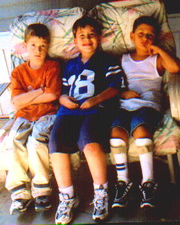 These are Nick's best friends...Eben on the left and Justin to the far right.